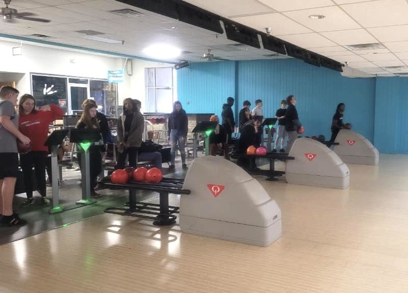 students at a bowling alley